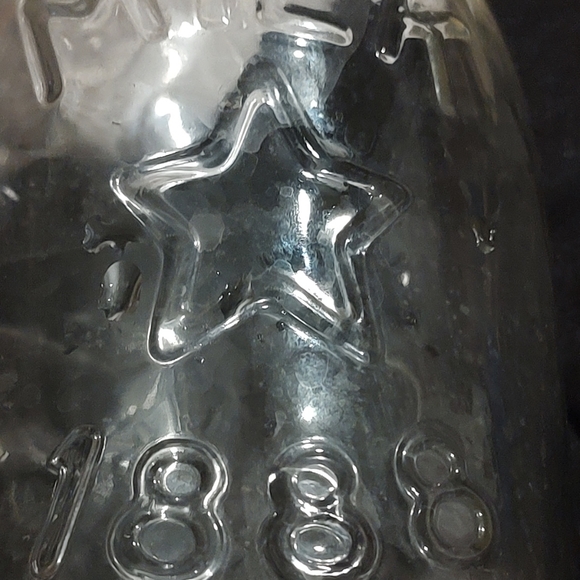 Vintage 1 quart glass milk bottle, embossed with an 1888,cow,star, and Canada - Picture 1 of 11